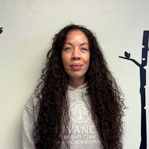 “Maegen Wilburn smiling in a warm, professional headshot as an RBT at ATC.