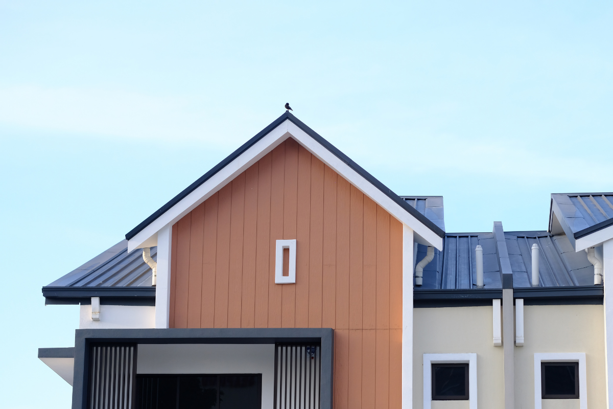 Pair of modern attached dual occupancy dwellings in a Melbourne western suburbs street, showing mirrored design