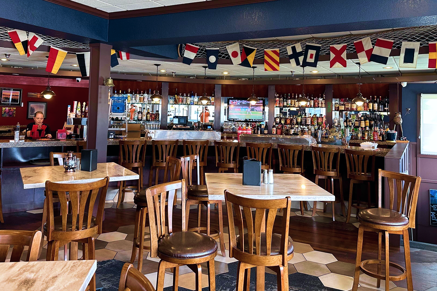 The open social atmosphere of Jeremiah's Pub, complete with good views and comfortable seating.