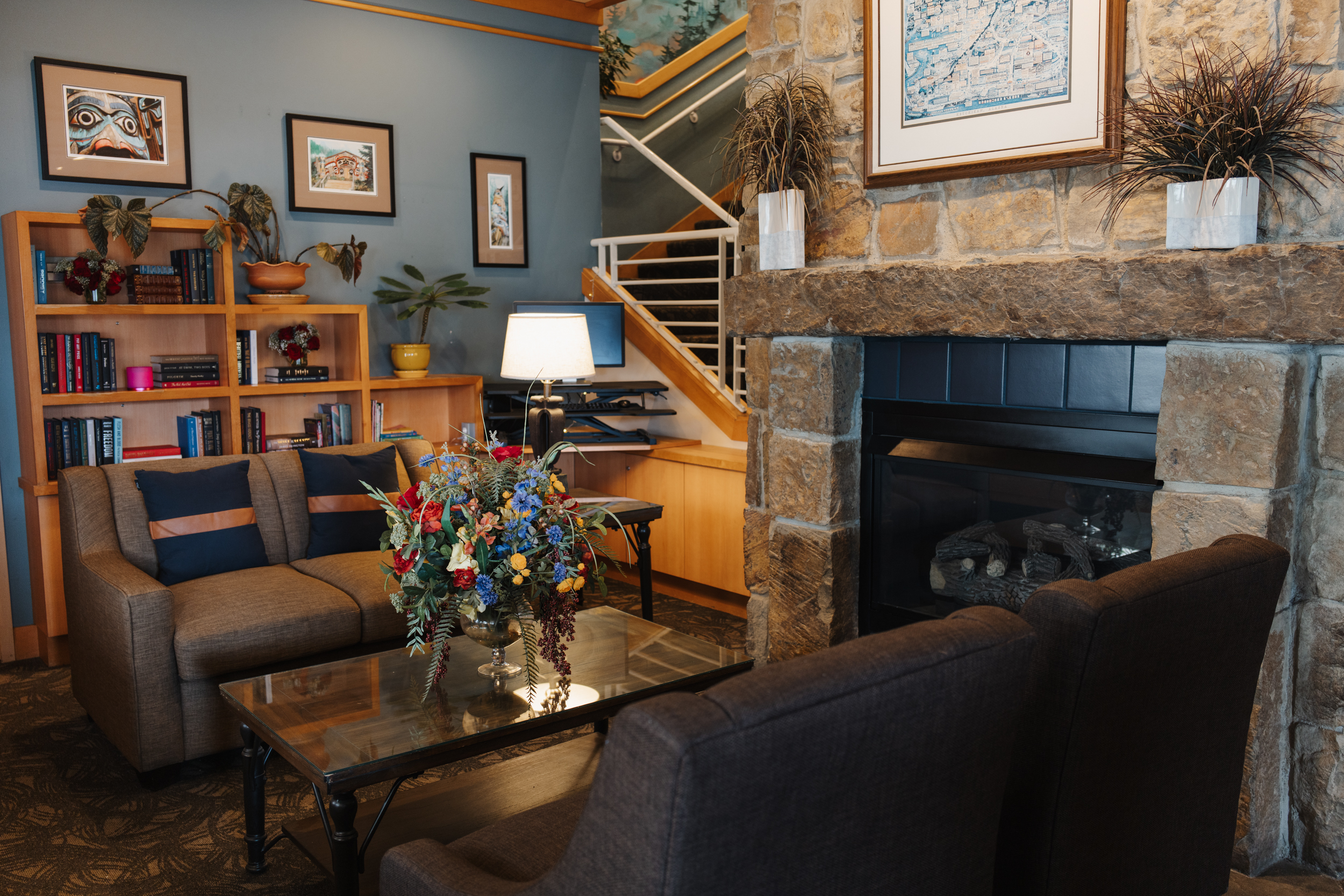 The fireplace and libarary section of our lobby.