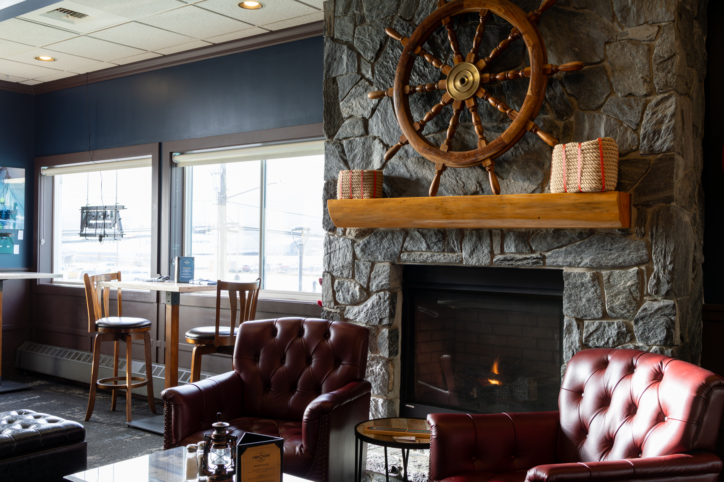 Comfortable booth seating at The Landing's Diner full of customers and home-style food.