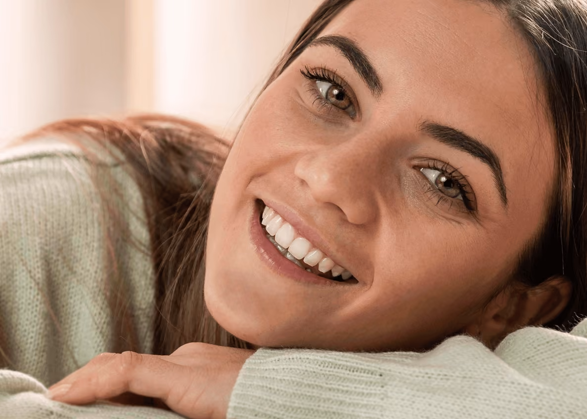 Smiling woman with bright, white teeth after professional teeth whitening, highlighting results from the best dentist in San Francisco for safe, effective cosmetic dental care.
