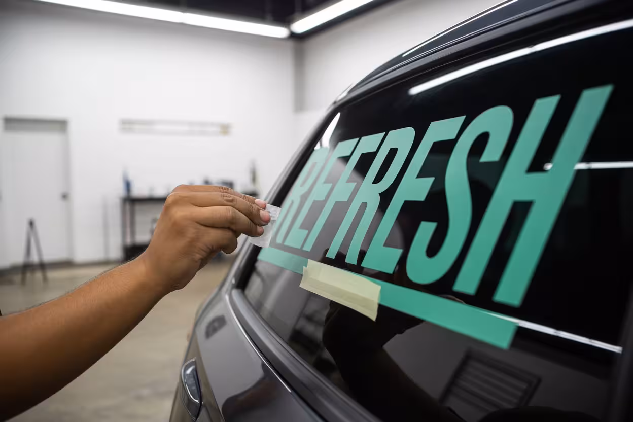 What is a decal? - Applying a decal on a car