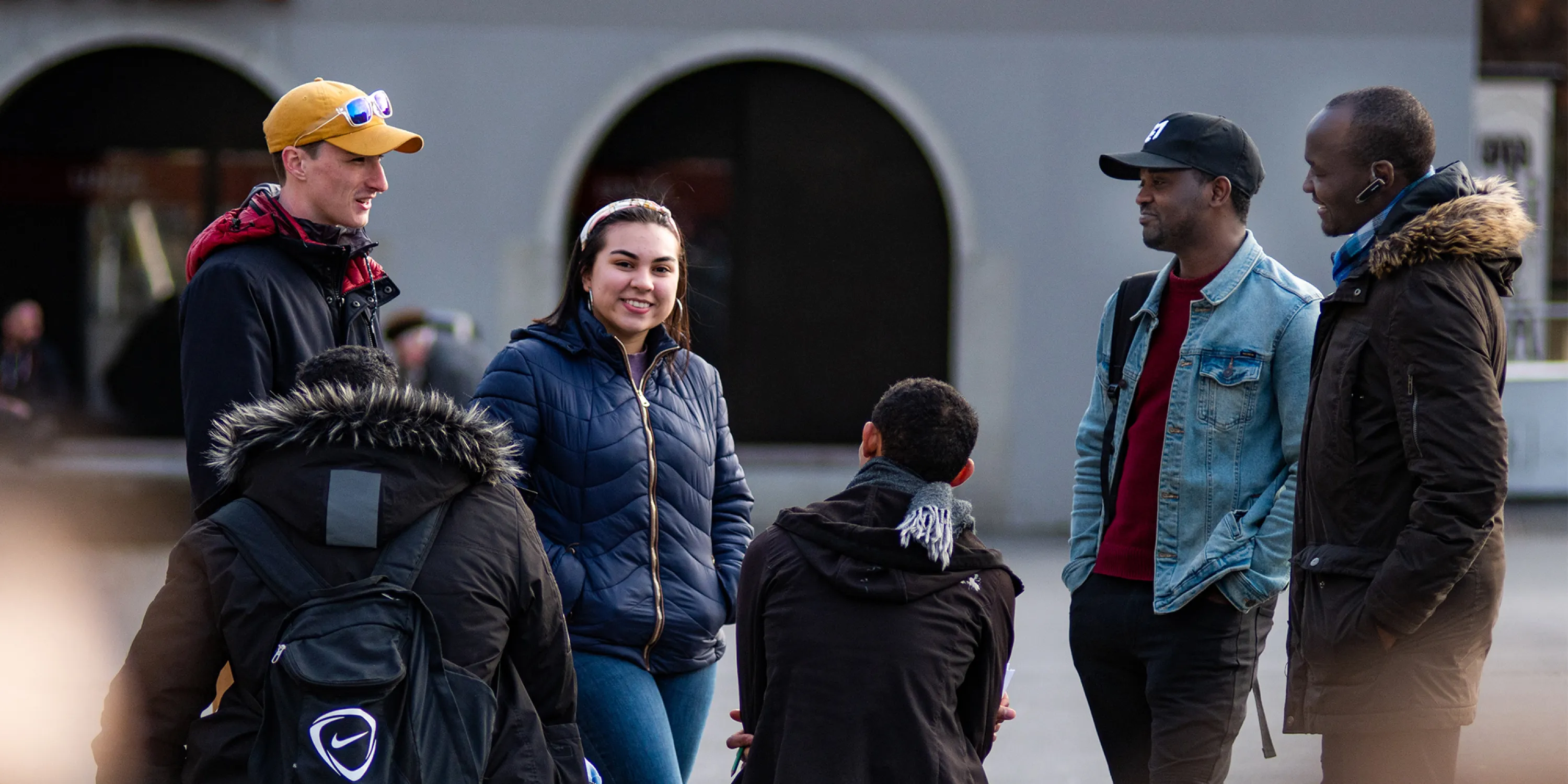A group of students gathered and smiling.