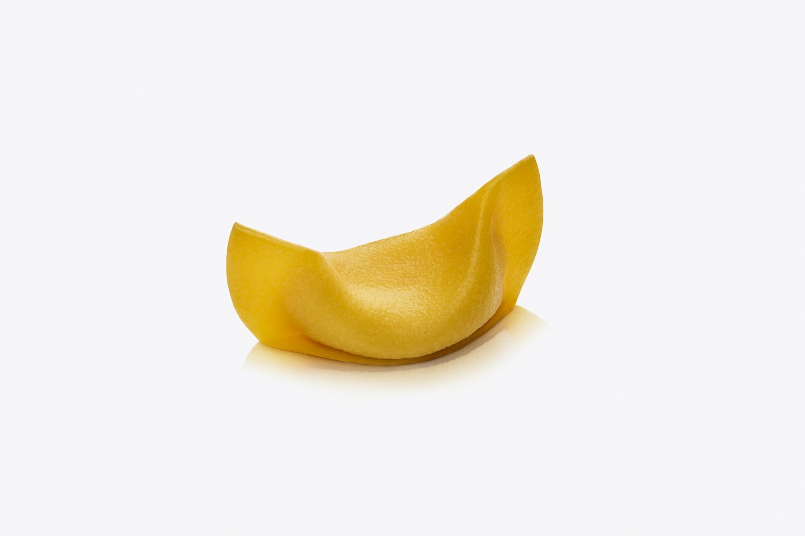 Casoncelli con Coda di Bue — un grande involucro di pasta fresca dorata dalla caratteristica forma a mezzaluna