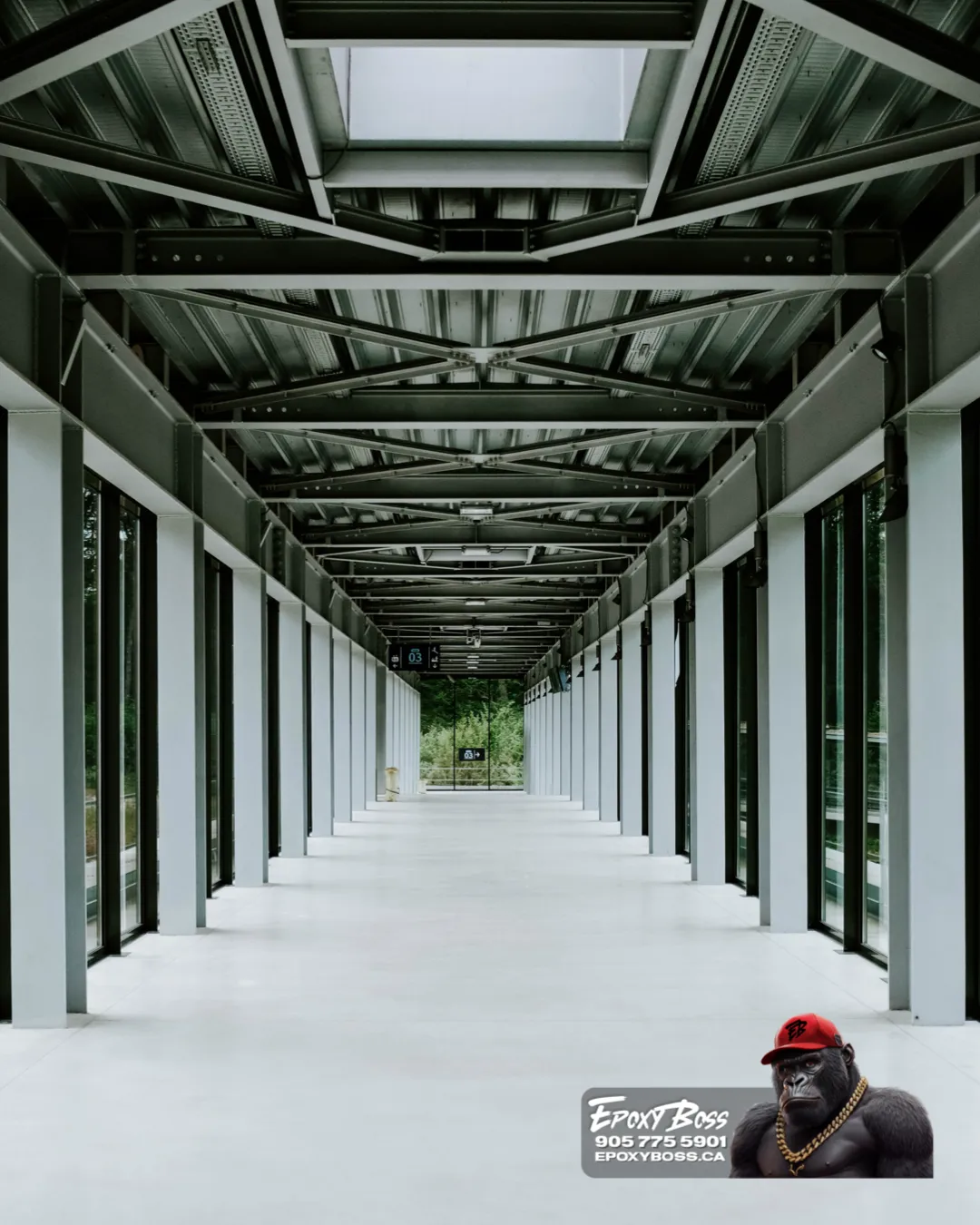 Epoxy Boss installing epoxy flooring in E-commerce fulfillment center