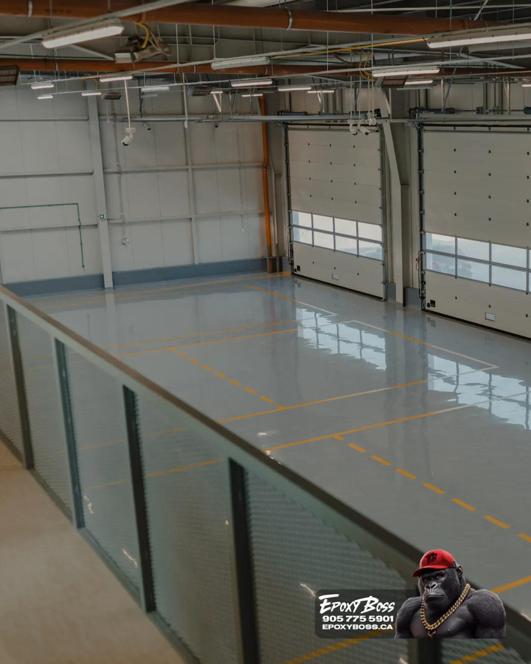 Industrial epoxy floor in Barrie manufacturing plant with forklift traffic