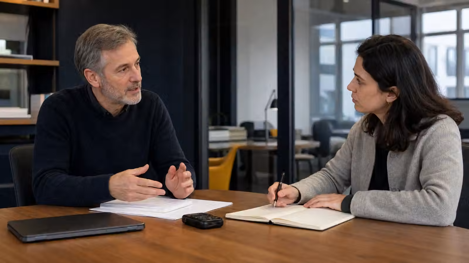 Expert spokesperson preparing for an international news interview with a journalist