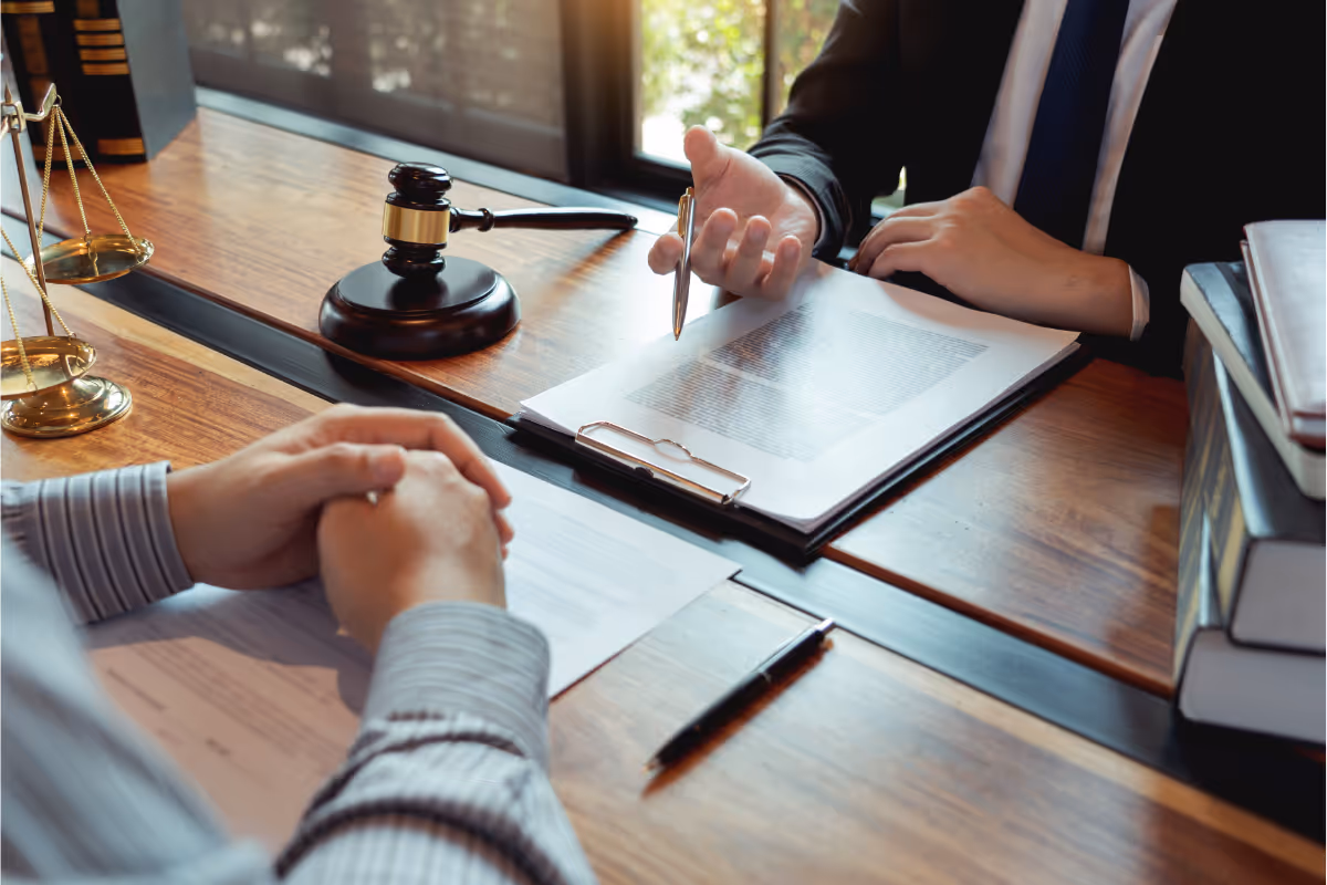A law office with a lawyer and client talking.