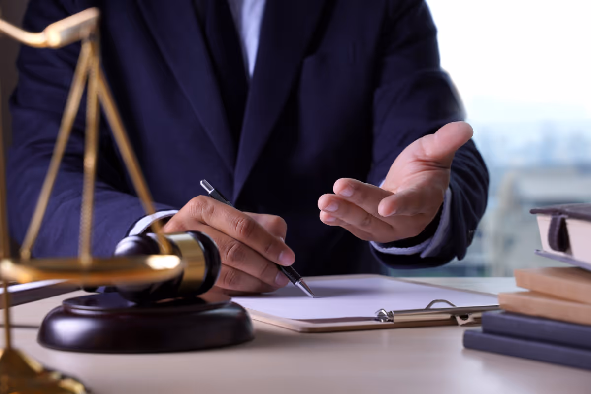 A lawyer consulting a client in an office.
