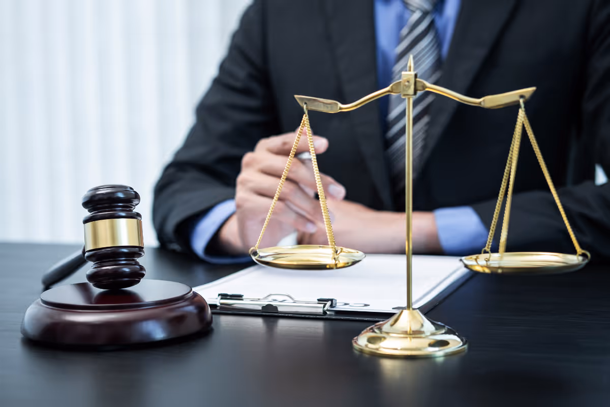 A lawyer at his office desk.