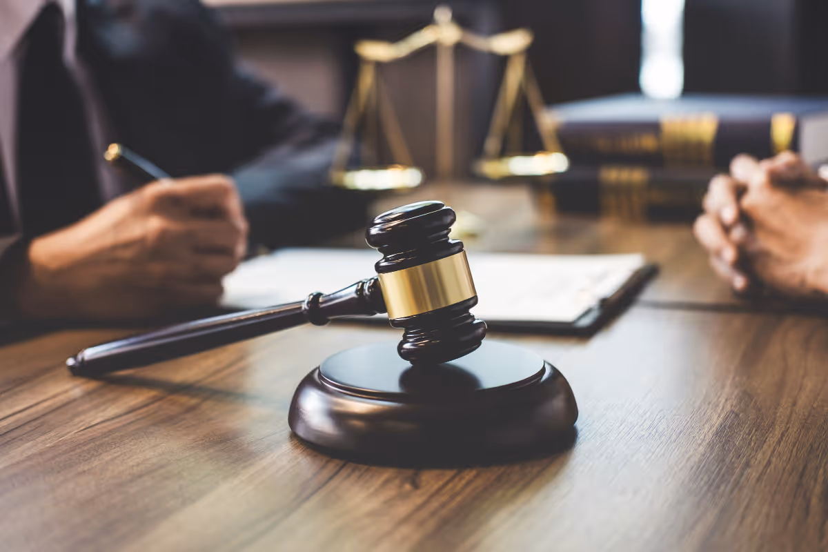 A law office with a lawyer and client talking.