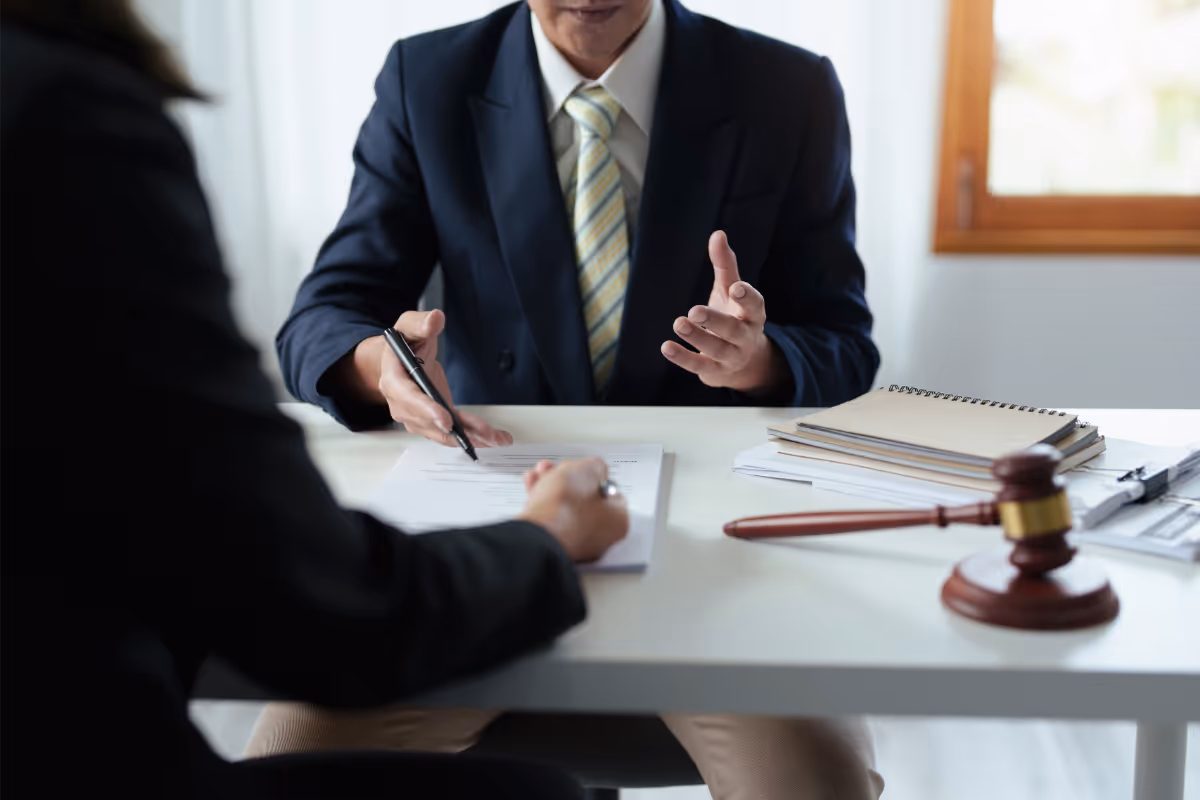 a lawyer in an office with a client