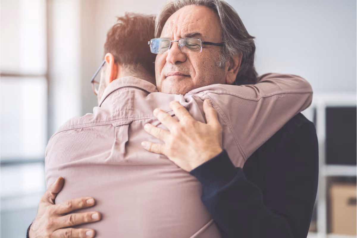 a man hugging his dad