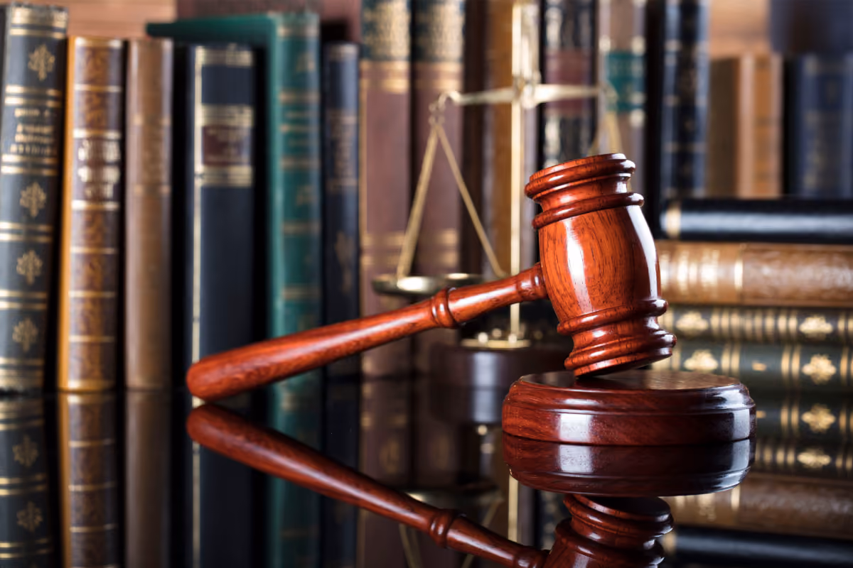 Criminal record with a gavel next to it