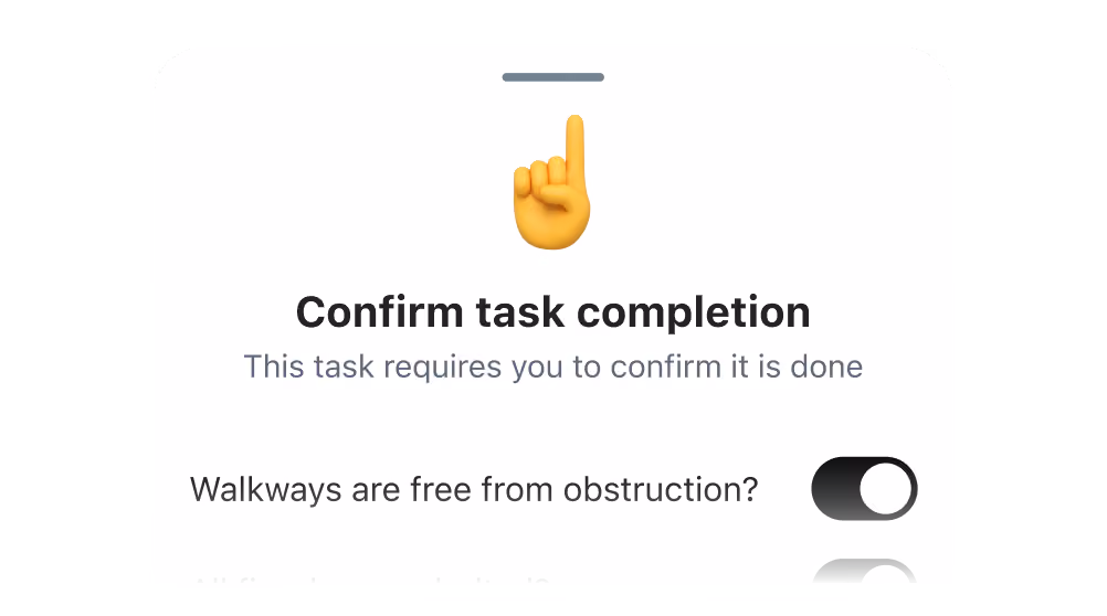 Mobile screen showing a task confirmation interface with a pointing finger emoji, the heading 'Confirm task completion,' and a subtitle 'This task requires you to confirm it is done,' followed by a toggle switch question asking if walkways are free from obstruction.