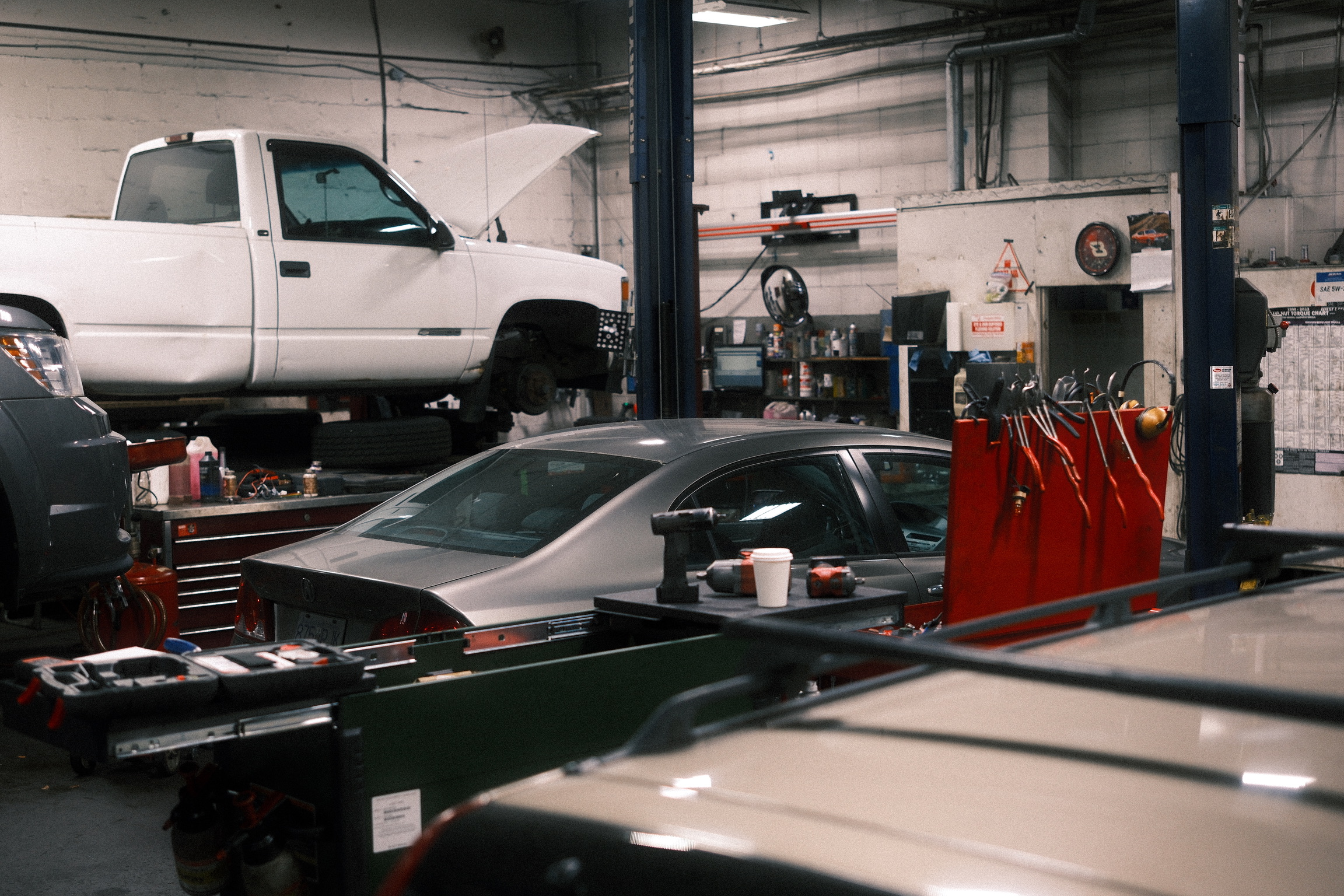 Service bays inside the Granville & Avery Automotive repair shop in Marpole, Vancouver