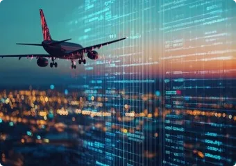 An airplane flying over a city at night.
