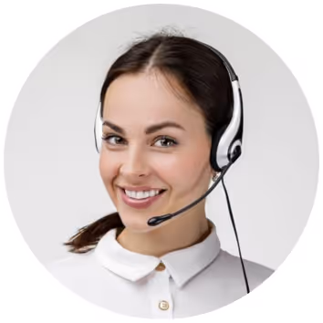 Smiling woman wearing a headset with microphone against a light background.