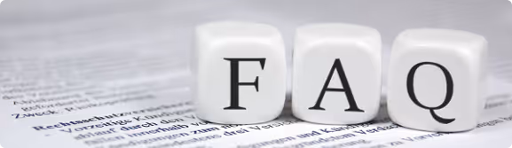 A close up of three dices with the word faq written on them.