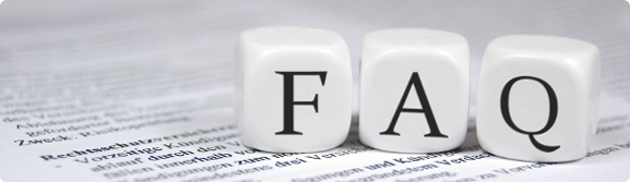 A close up of three dices with the word faq written on them.