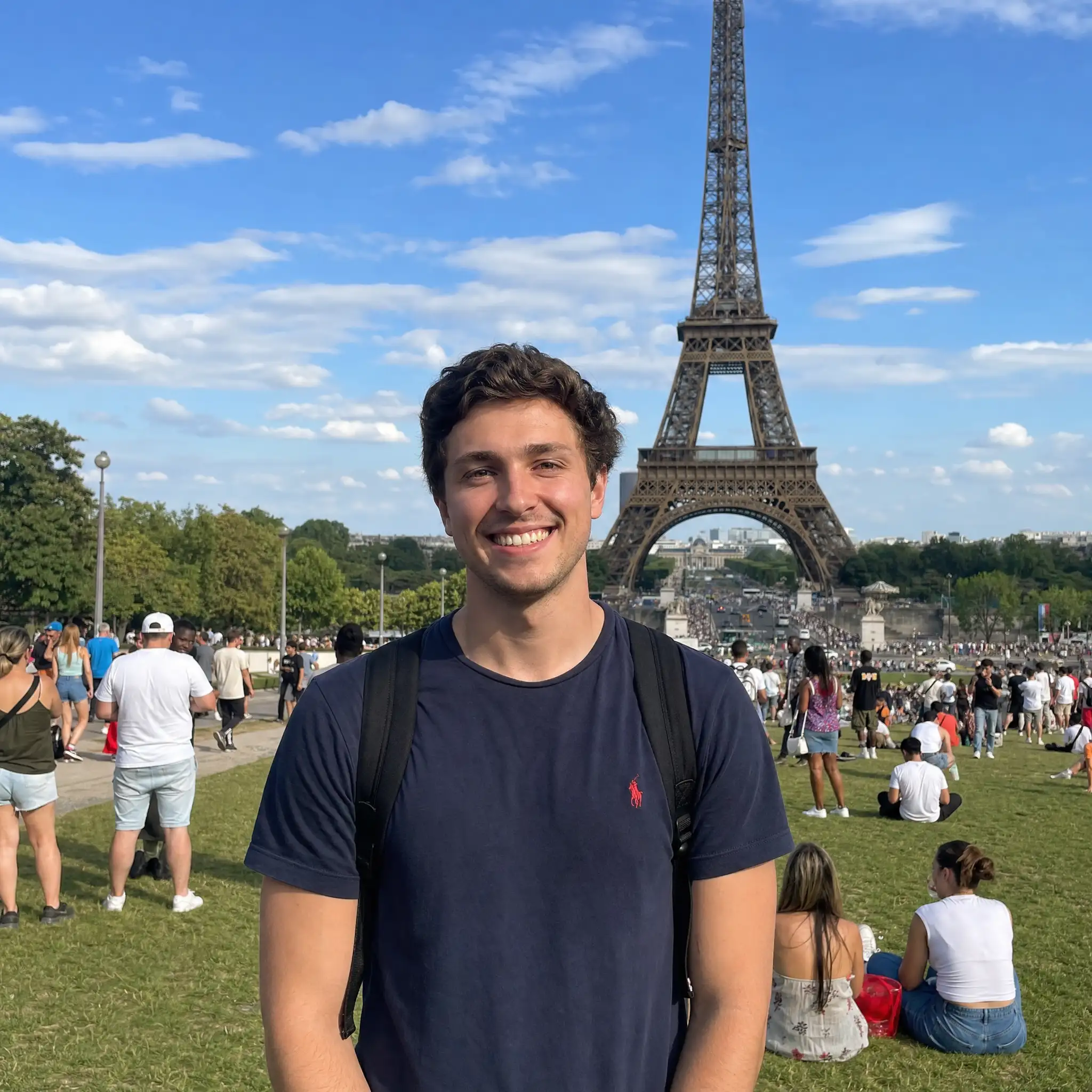 Original photo with a crowd of people in the background