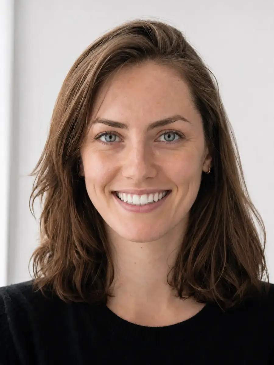 Same portrait with AI-added smile