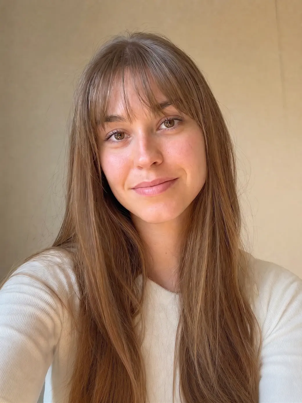 Same person with AI-generated bangs