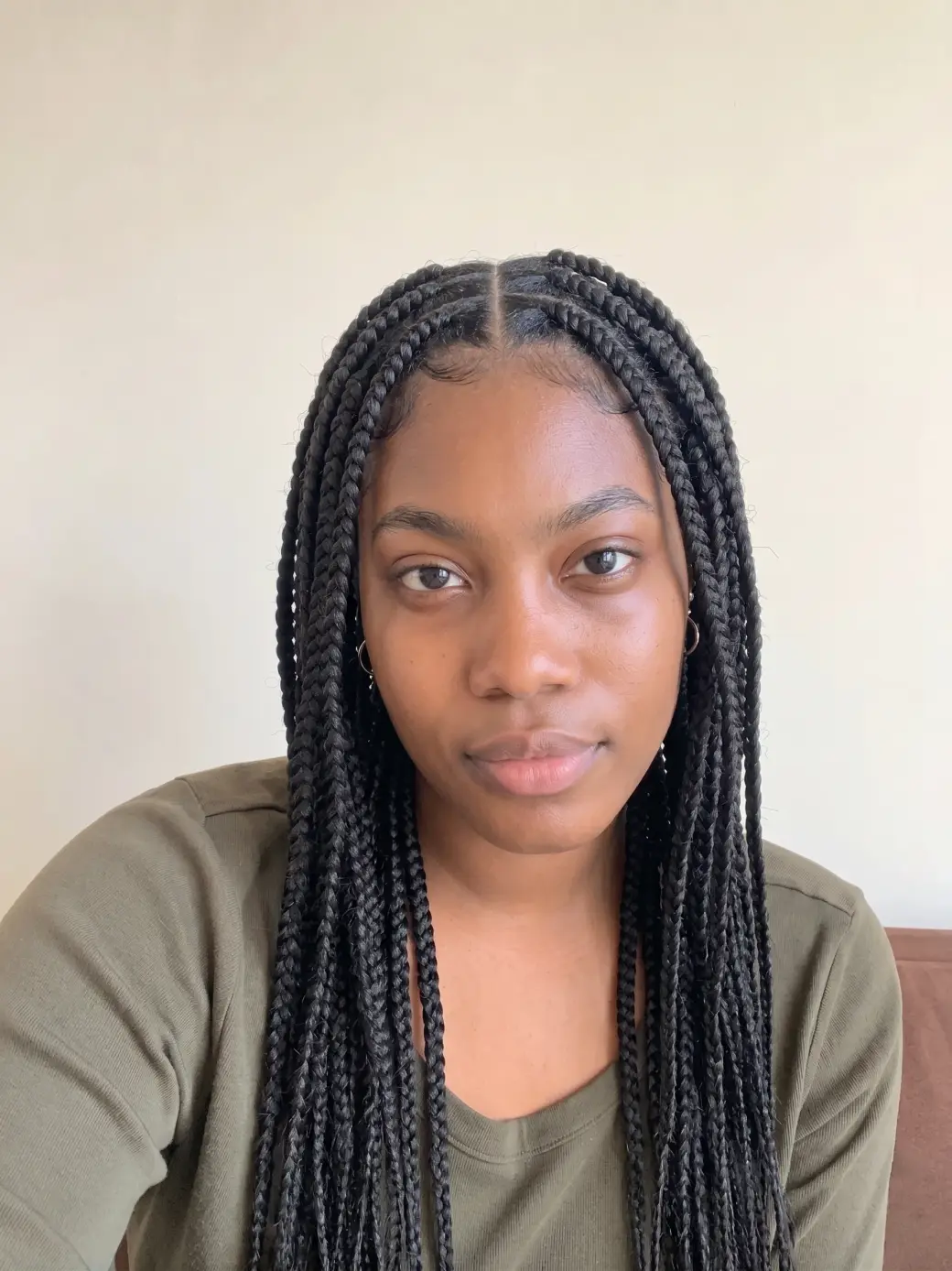 Same person with AI-generated braids