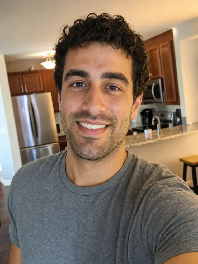 Original smiling selfie of a young man