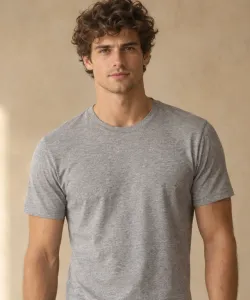 Young man with curly hair in a grey T-shirt