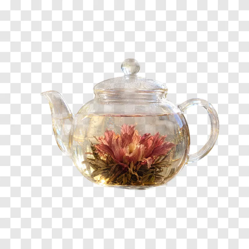 Glass teapot with flowering tea, background removed