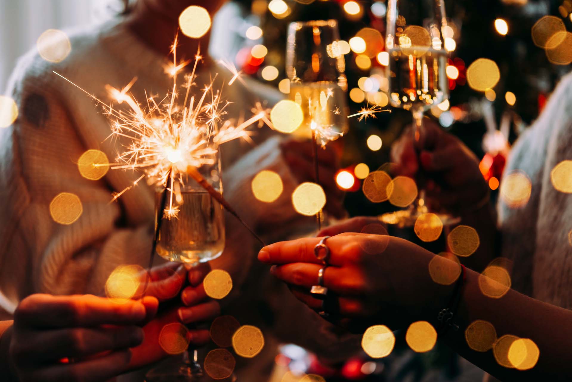 Image of people holding sparkelers 