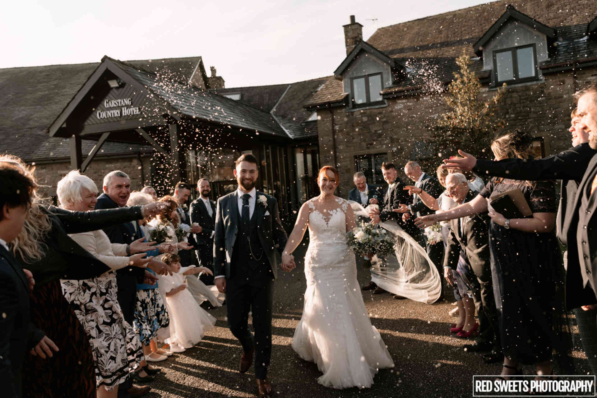 Bride and groom celebrating at Garstang Country Hotel wedding venue in Lancashire