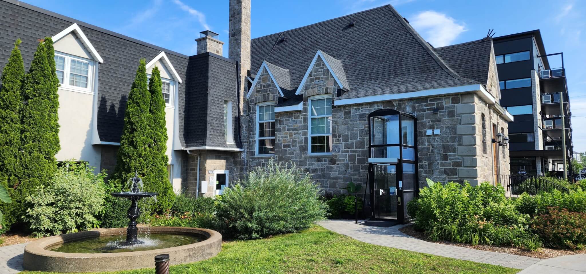 Mom holding a baby while reading a book