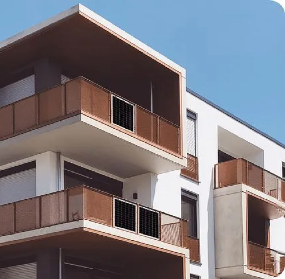 Mom holding a baby while reading a book