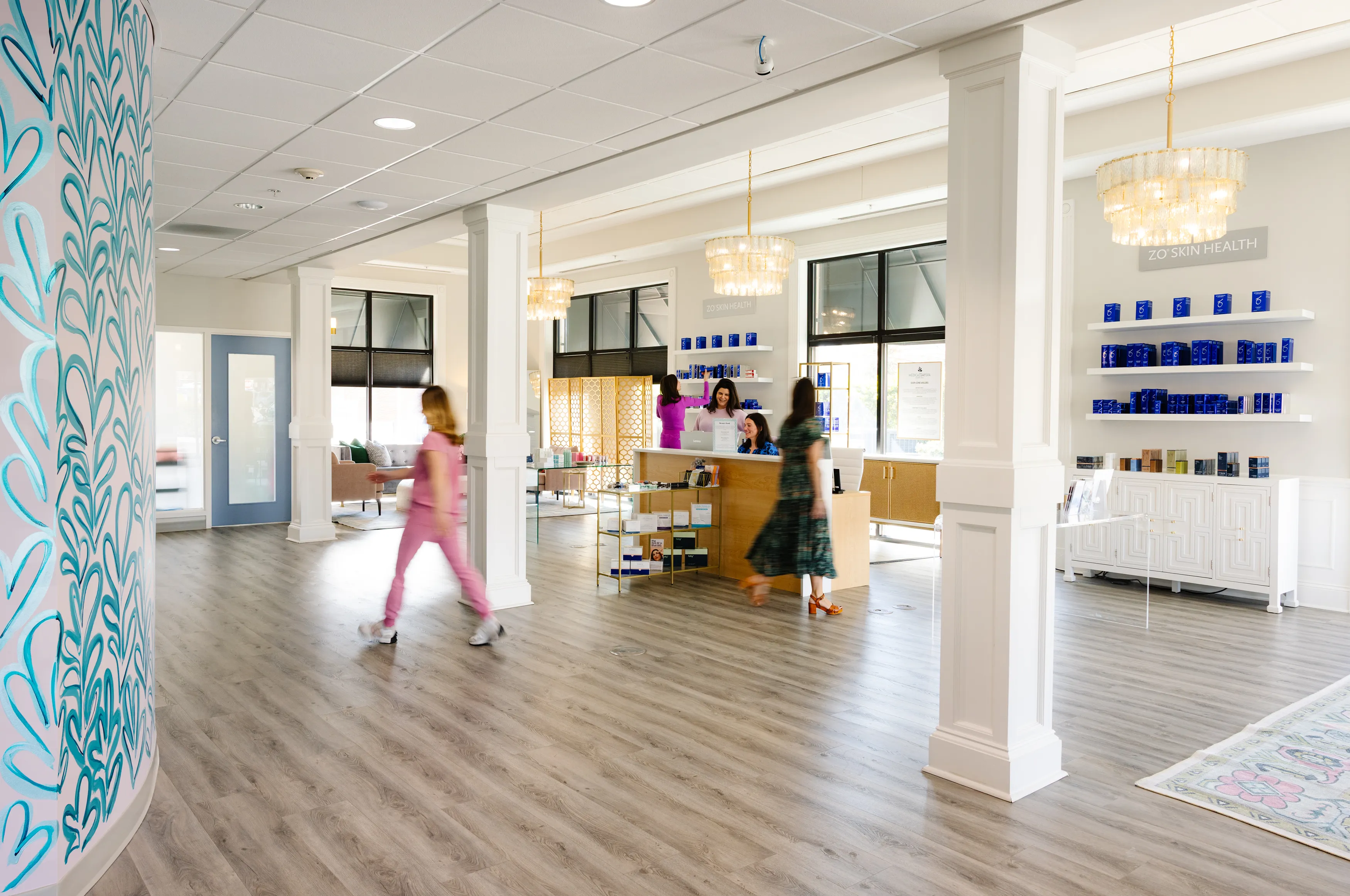 Photo of the Chael Hill day spa lobby and counter. Products on shelves 