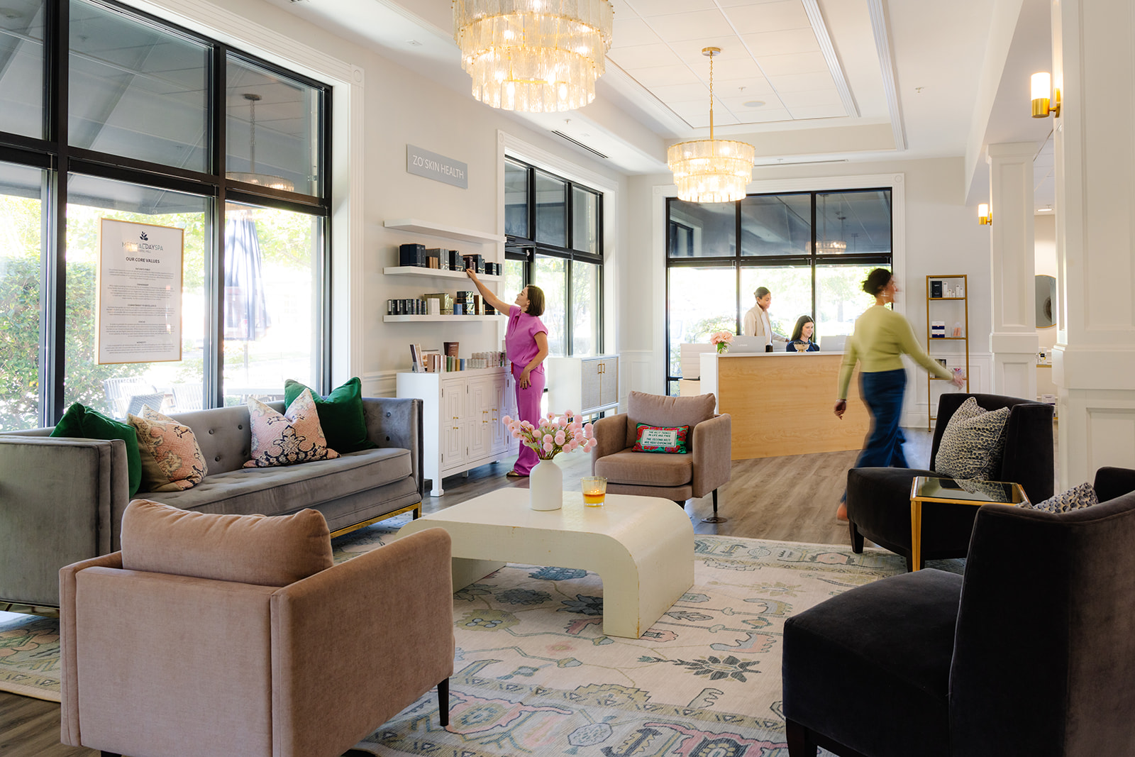 Photo of the Chael Hill day spa lobby and counter. Products on shelves 