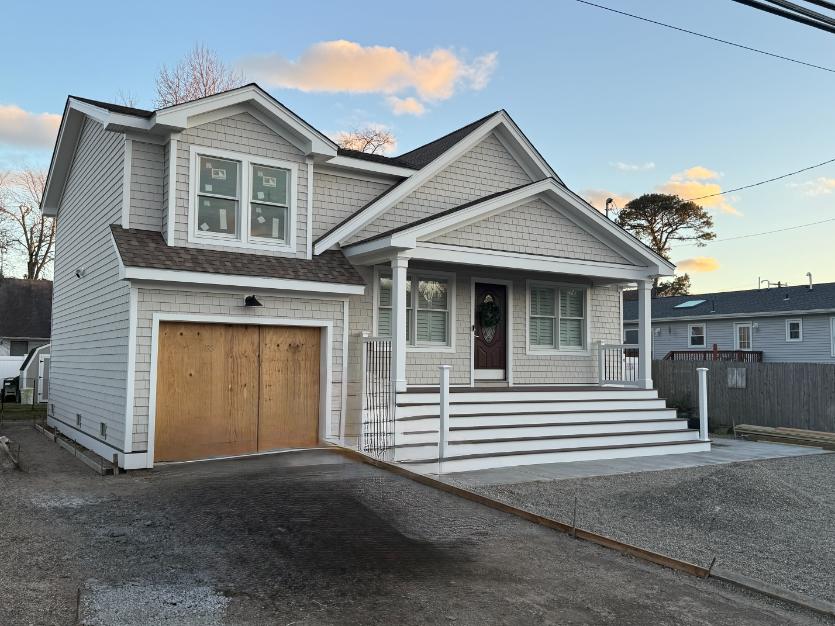 Front elevation of porch reconstruction and home addition in Brick, NJ completed by J.A.Y. Construction, correcting sagging caused by improper porch footings after a home lift.
