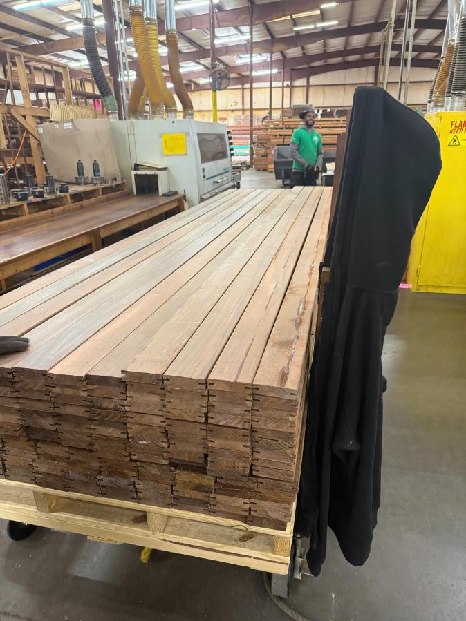  Precision-milled Ipe hardwood boards prepared for exterior decking and siding in New Jersey