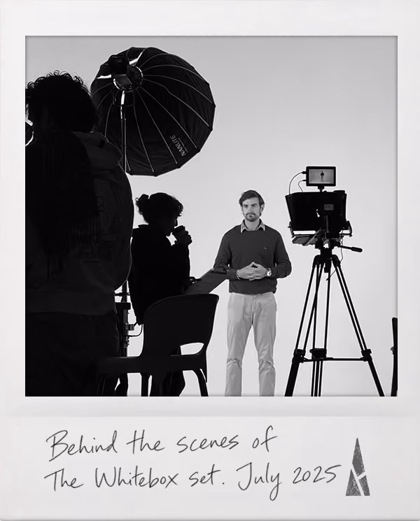 Polaroid picture of a note pinned on a board saying Shhh... FILMING IN PROGRESS