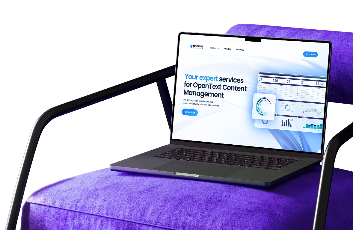 Laptop on a purple chair displaying a website offering expert services for OpenText content management with charts and data visuals.