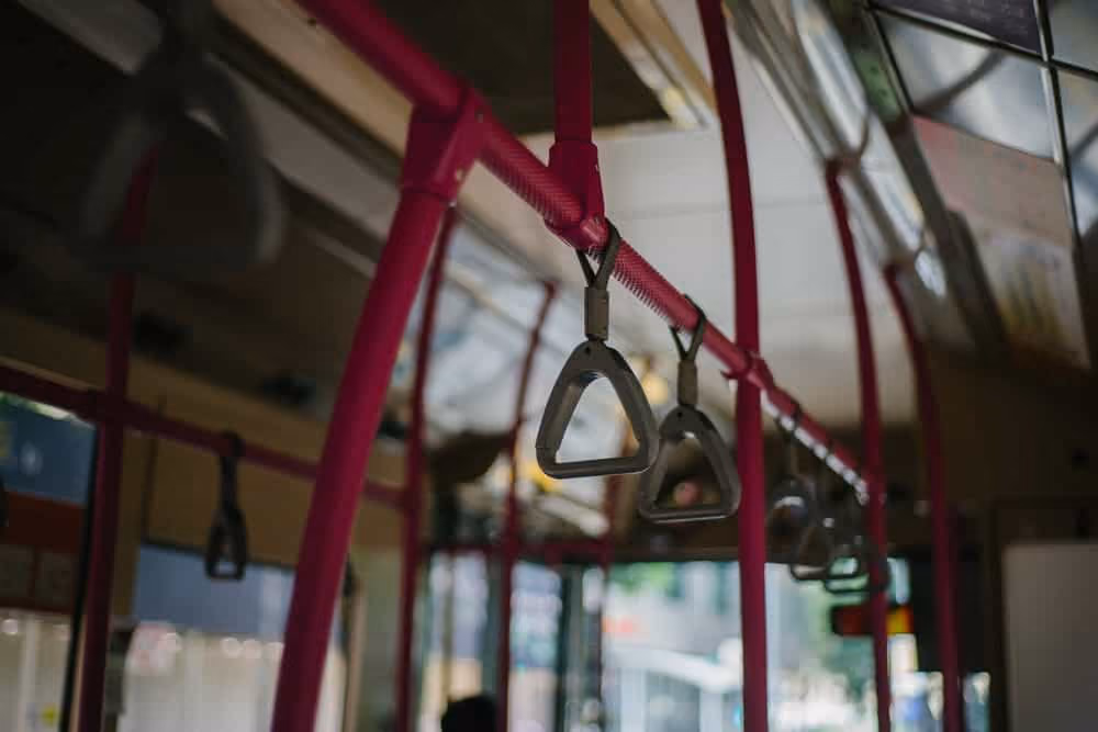 Close up of bus handles.