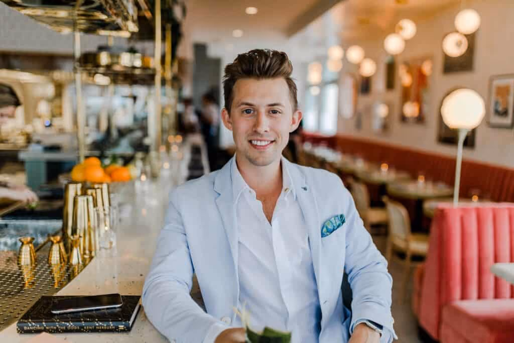 Young business man smiling at camera.