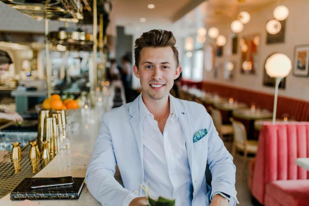 Young business man smiling at camera.