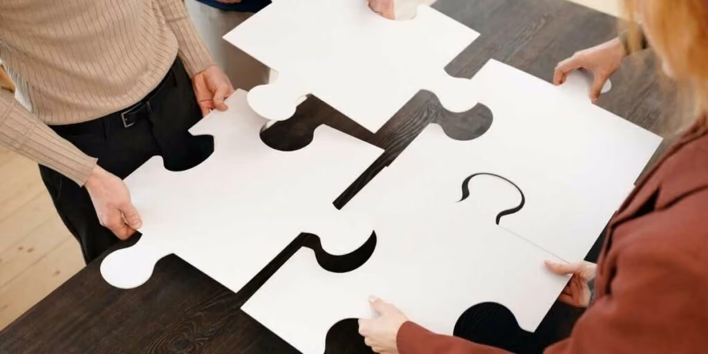 Team solving a puzzle in the workplace