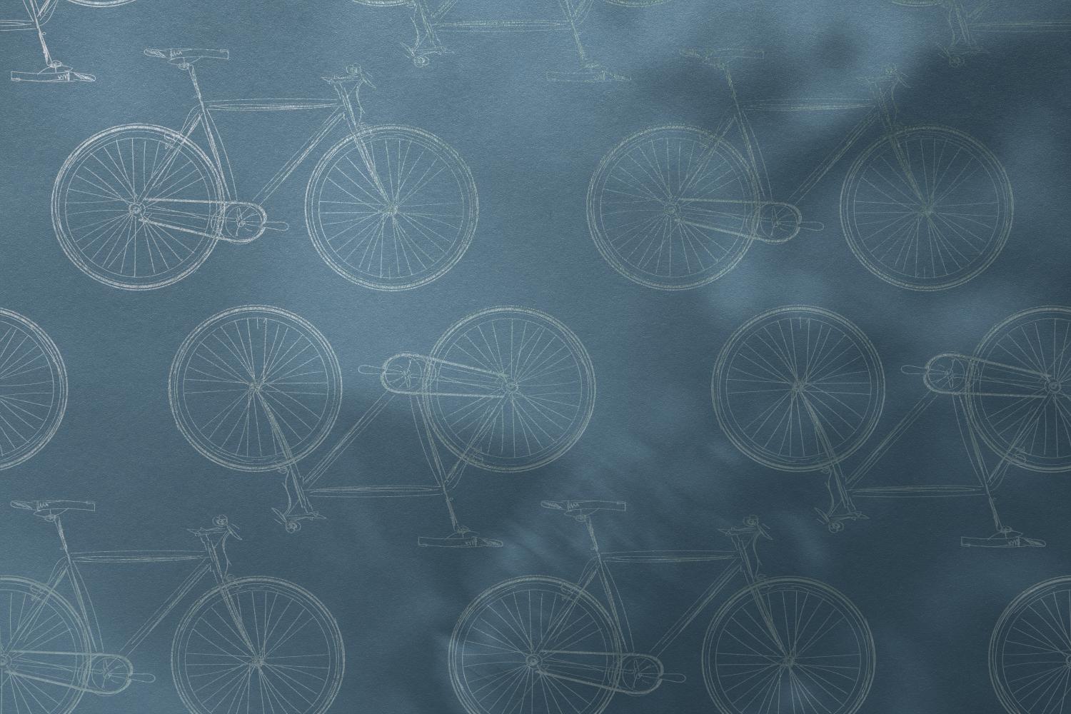 hand drawn bike pattern on a textured teal background