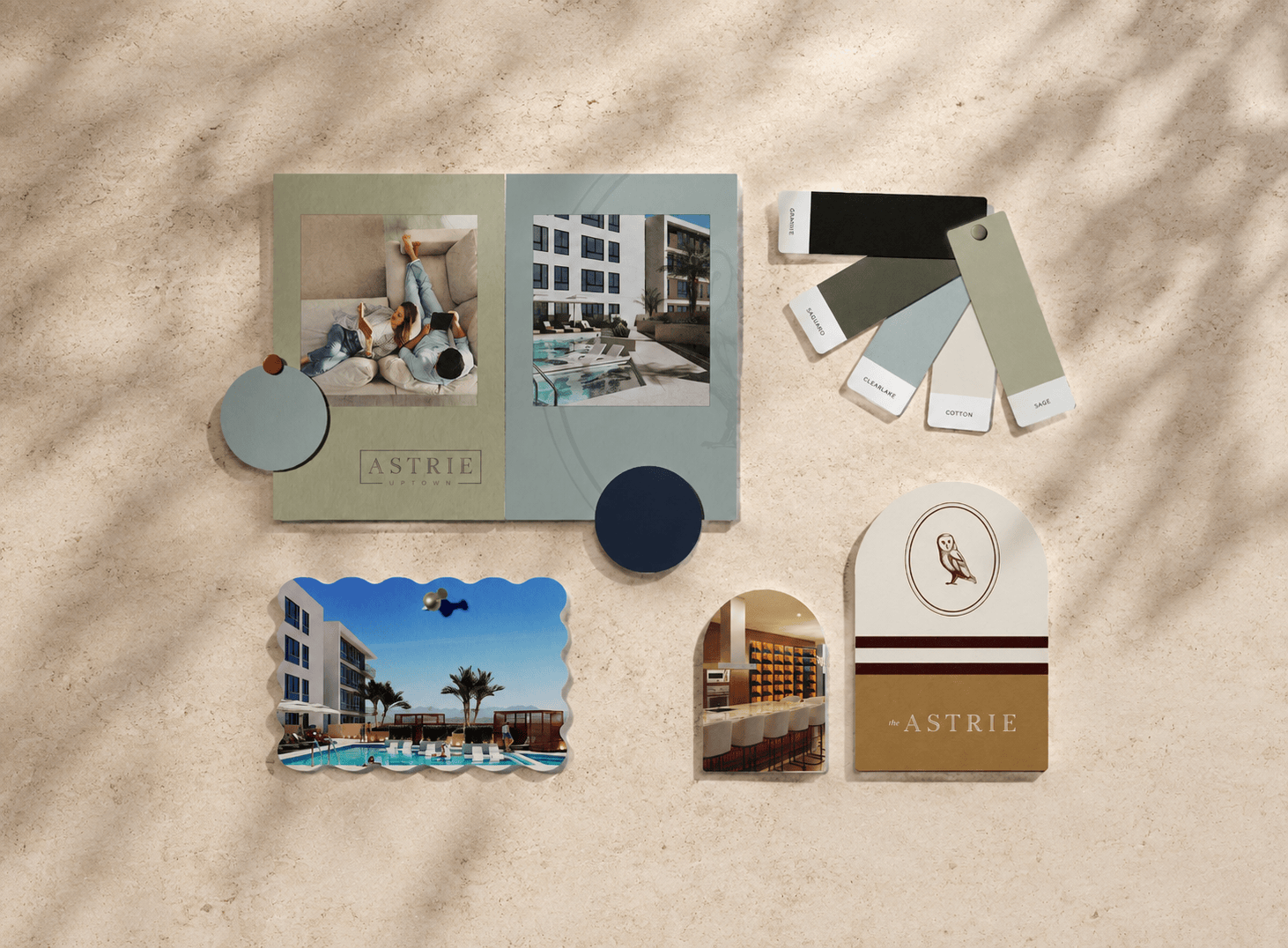 astrie color swatches displayed on a natural stone table top with shadows