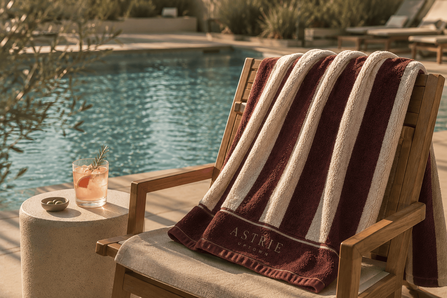 a plush, astrie branded pool towel