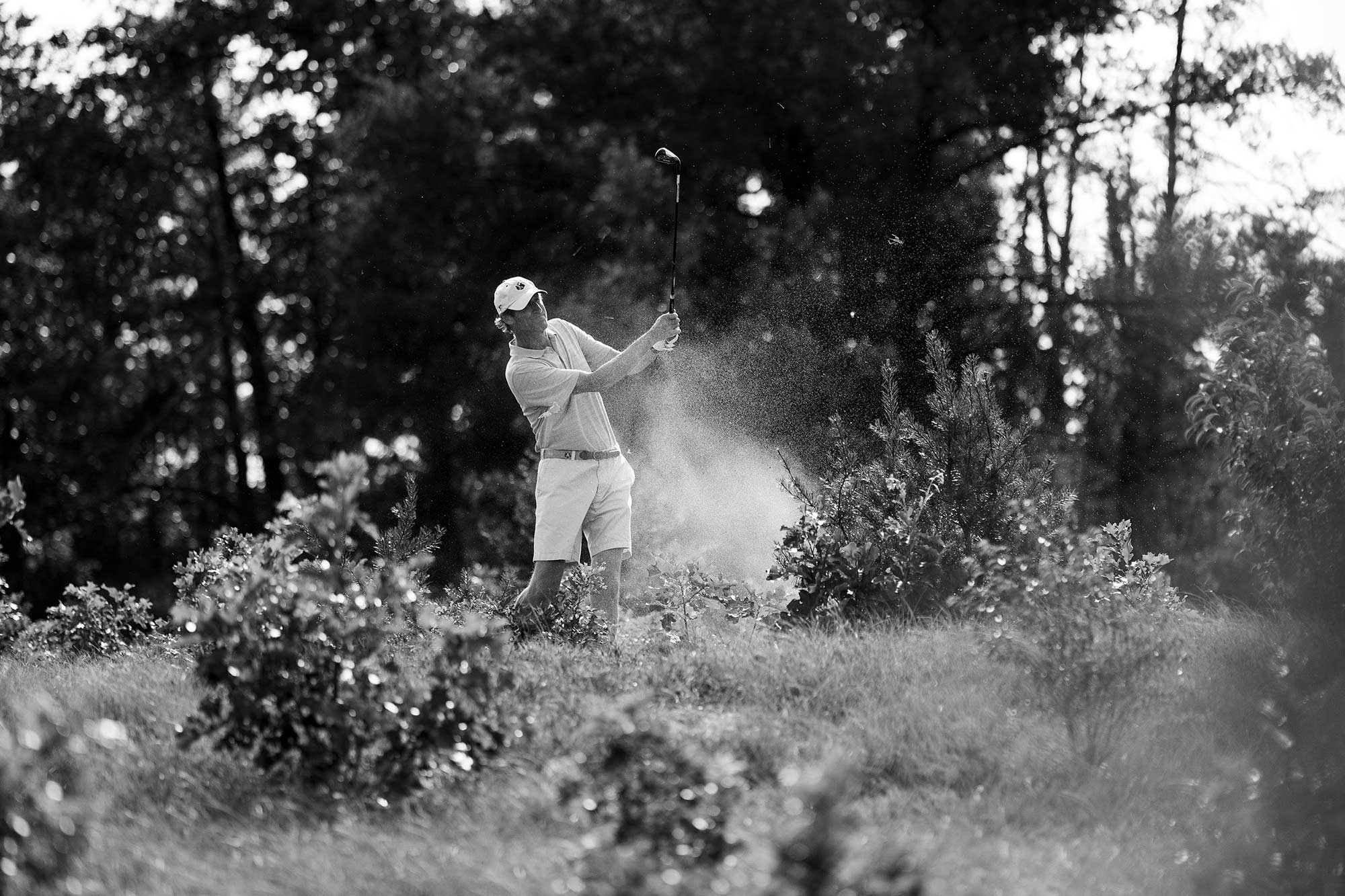 Shot of a golder after hitting the golf ball